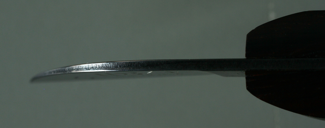 Detalle del bisel del cuchillo de chip carving